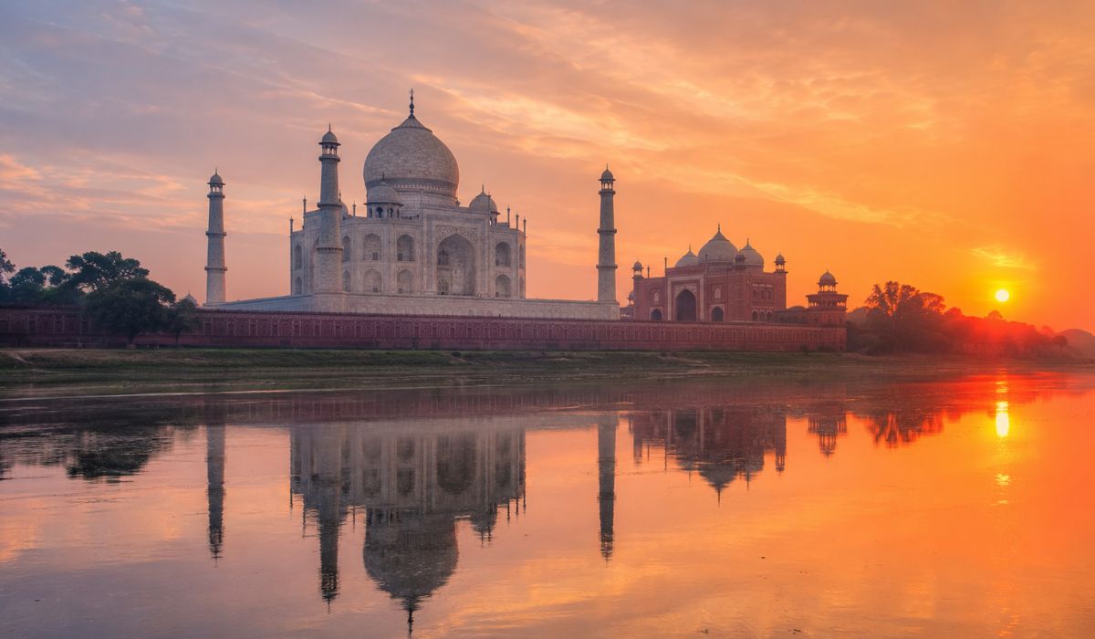 Taj Mahal at sunrise viewed from across the Yamuna river in hotel of agra mistakes tourists make when booking hotels in Agra